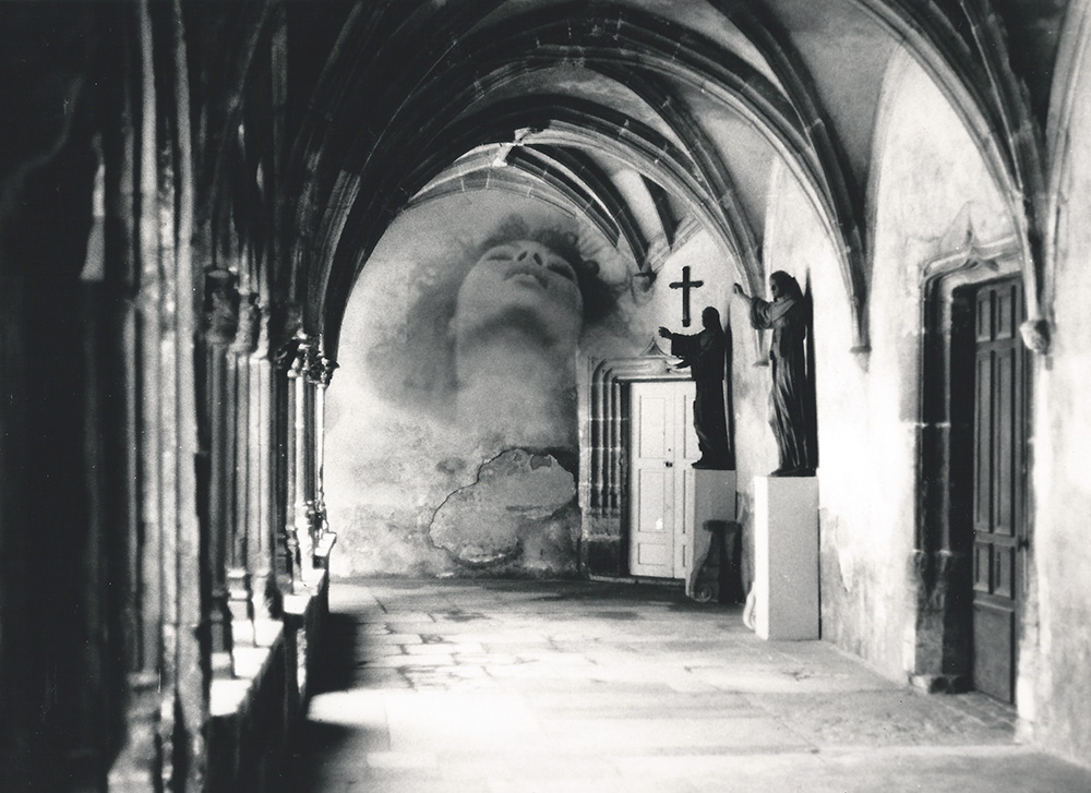 darkroom experiment 1991. photograph of a hallway in a monastery in france. blended with a photograph of the tv-screen of some woman having an orgasm